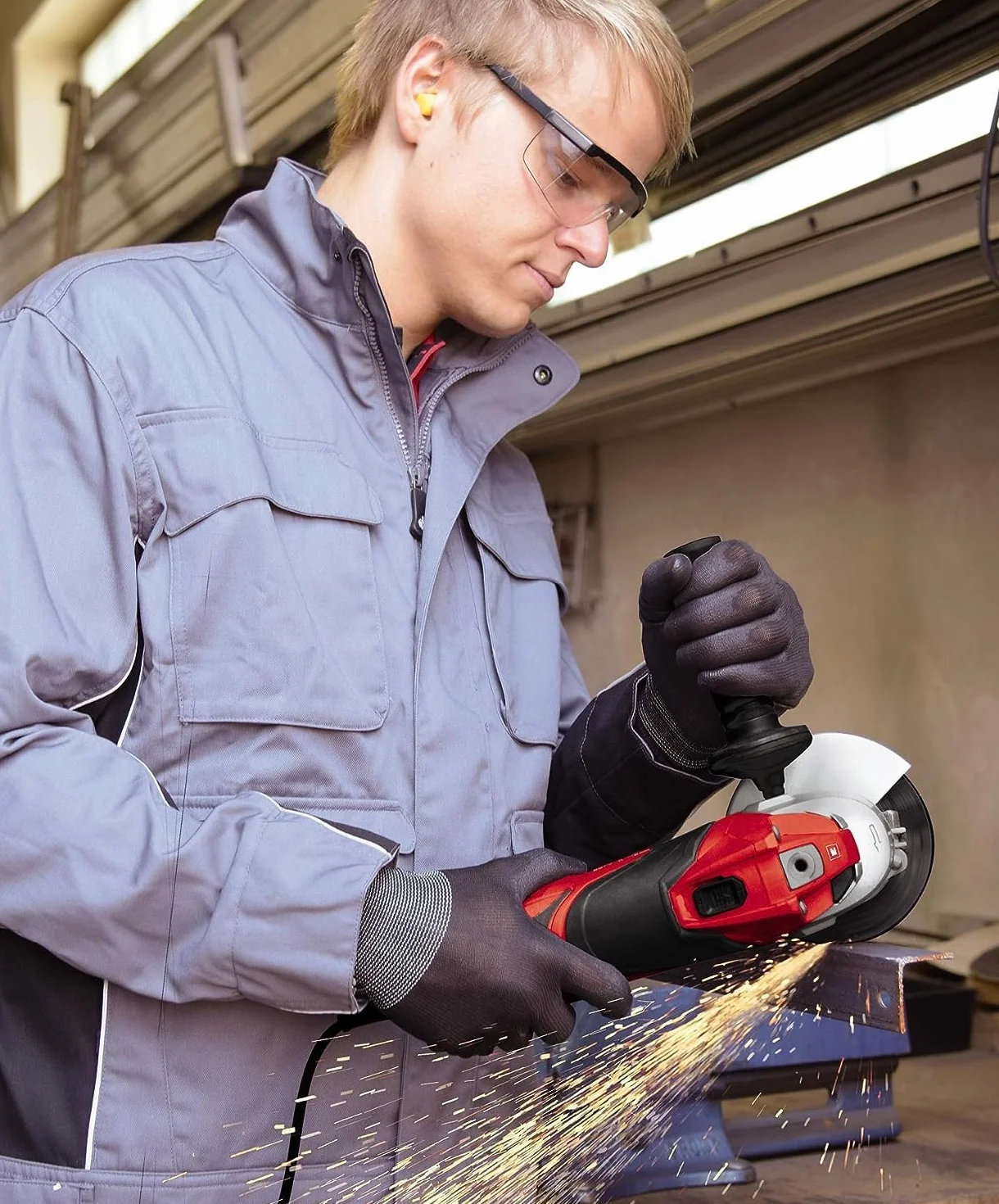 Einhell Szlifierka kątowa TE-AG 125 CE (1100 W, tarcza Ø 125 mm, stała elektronika, osłona ochronna, klucz w regulowanym dodatkowym uchwycie, bez tarczy tnącej)